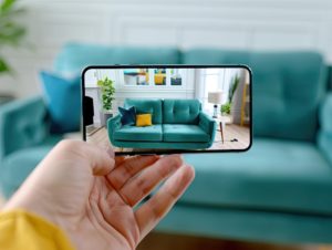 An interactive e-commerce website, a shopper using augmented reality to visualize furniture in their living room, merging technology and consumer convenience